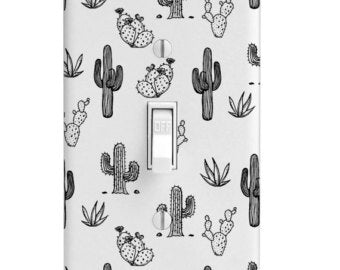 Cactus Doodle Light Switch Cover: A simple repeating pattern of different types of cacti & succulents, all in black and white.