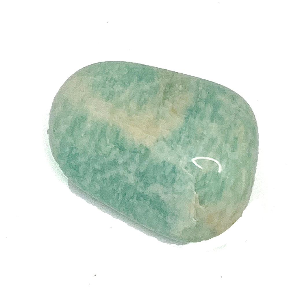 Polished aventurine: a closeup of a smooth stone, which is light blue with veins of white and cream.
