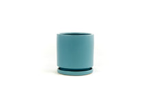Load image into Gallery viewer, Antique Teal: this cylindrical pot is a denim blue color.
