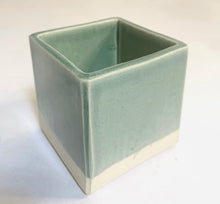 Load image into Gallery viewer, A cube planter with a light blue-green glaze. The bottom 1/8th is unglazed.
