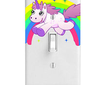 Load image into Gallery viewer, Unicorn Light Switch Cover: a cartoon pink unicorn in front of a rainbow leaps over the light switch.
